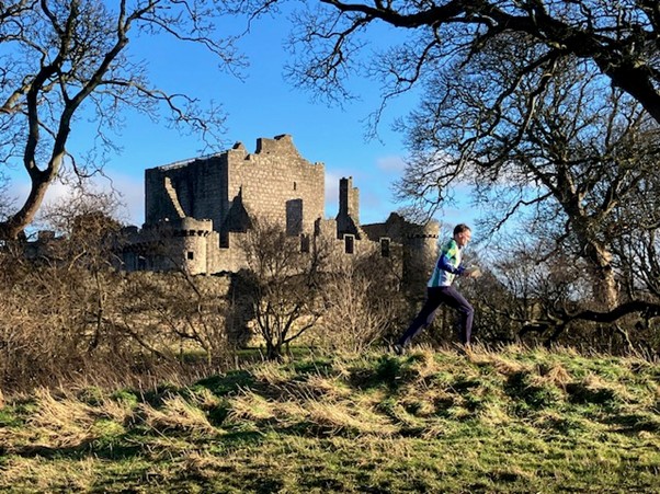 Running_past_the_castle_by_Katherine_Ivory
